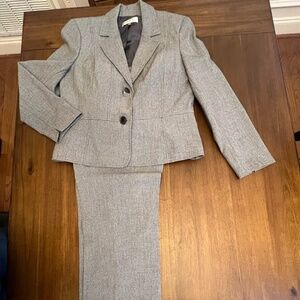 Light gray suit.